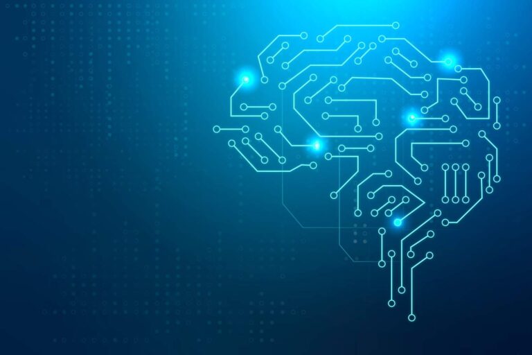 Representación gráfica de la inteligencia artificial mediante la silueta de un cerebro compuesto por conexiones y circuitos electrónicos luminosos.